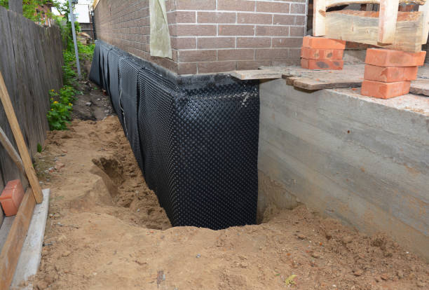 SJ Waterproofing Pros technician performing targeted Sump Pump Installation assessment in Wilberforce, OH